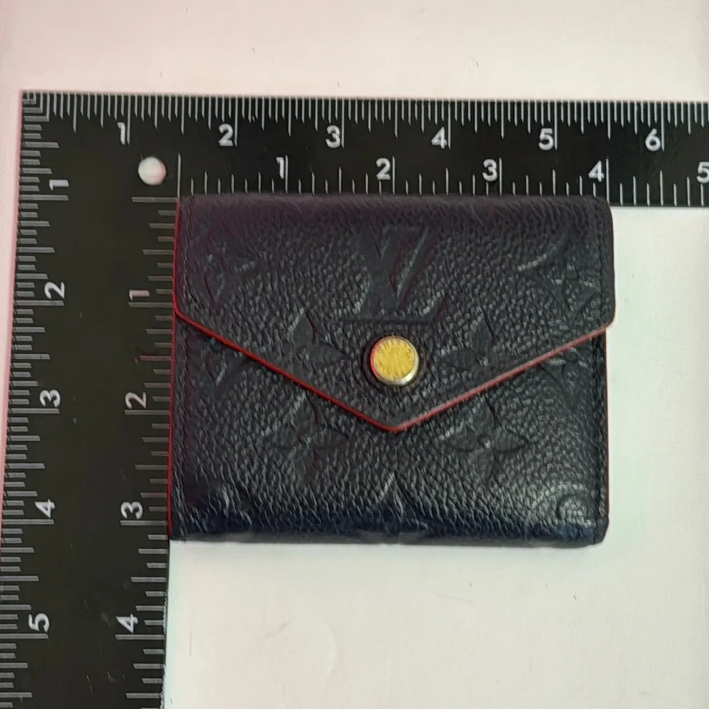 Louis Vuitton Black Embossed Monogram Compact Wallet with Red Trim